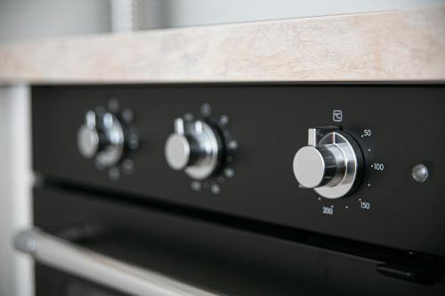 une fermeture des boutons d'un four dans l'établissement F2 hypercentre - Proche gare - WIFI gratuite, au Havre