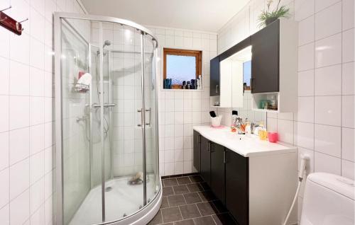 a bathroom with a shower and a sink at Gorgeous Home In Sekken With House Sea View in Molde