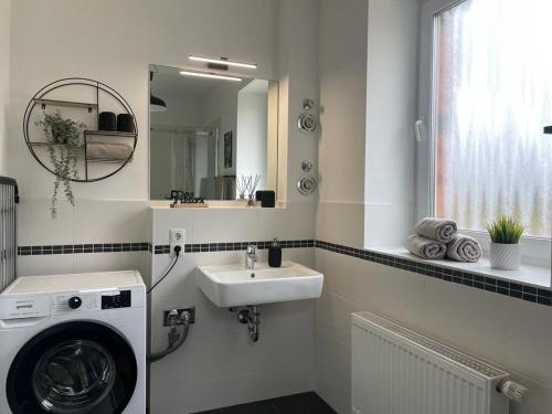 Ένα μπάνιο στο Apartment 1 am Werlsee, Grünheide