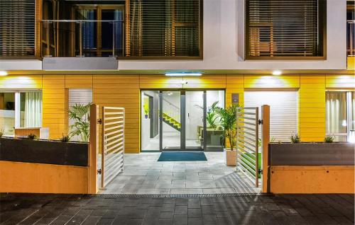 an entrance to a building with a door open at 2 Bedroom Cozy Apartment In Hel in Hel