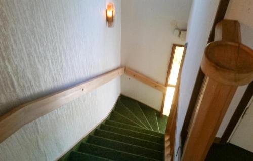 a small room with a staircase and a stair case at 3 Bedroom Beautiful Home In Västervik in Västervik