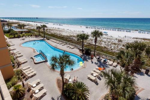 an aerial view of a resort with a beach at Azure in Fort Walton Beach