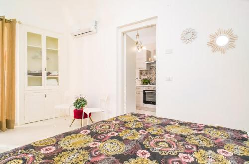 Ένα ή περισσότερα κρεβάτια σε δωμάτιο στο B&B Alba 2