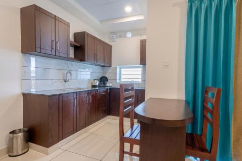 Kuchyň nebo kuchyňský kout v ubytování BnB Homes, Technopark, Trivandrum