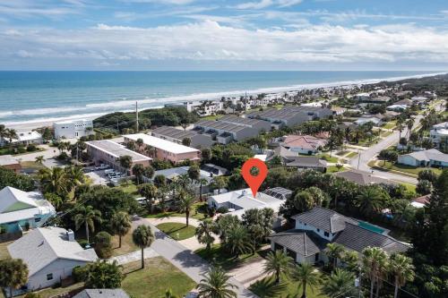 an aerial view of a suburb with a red marker at Surfs Up - Retreat At The Beach With Heated Pool in Melbourne Beach