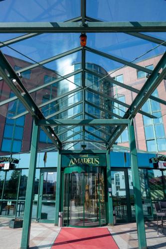a view of a building with a glass facade at Hotel Amadeus Frankfurt in Frankfurt/Main