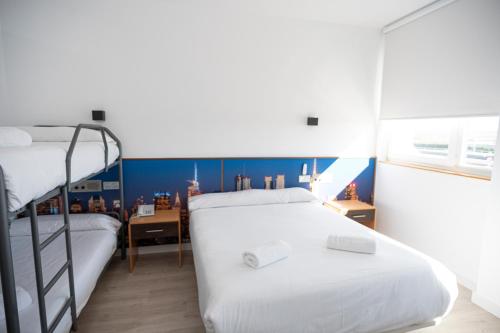 Posteľ alebo postele v izbe v ubytovaní Restaurante Hotel Abadesa