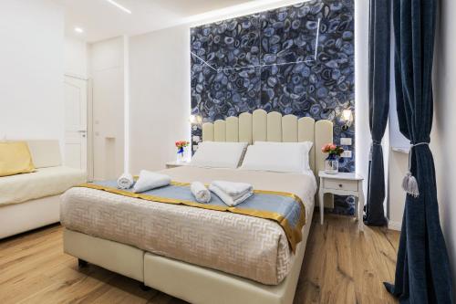 Postel nebo postele na pokoji v ubytování Navona Central Relais