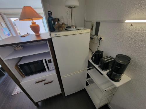 A cozinha ou cozinha compacta de Charmant appartement type T2 proche de la mer