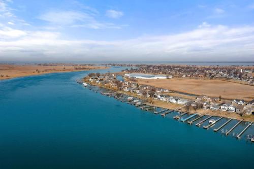 an aerial view of a marina in the middle of the water at Lakeside Bliss 2BR, 1BA with All Modern Comforts in Algonac