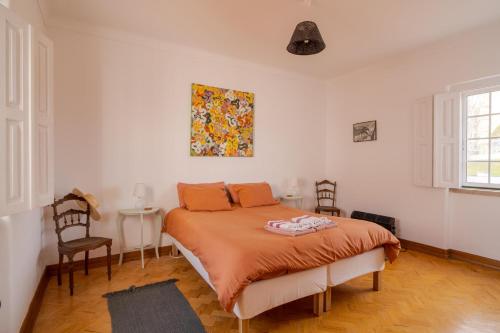 Postel nebo postele na pokoji v ubytování Manas Slowliving - Sines