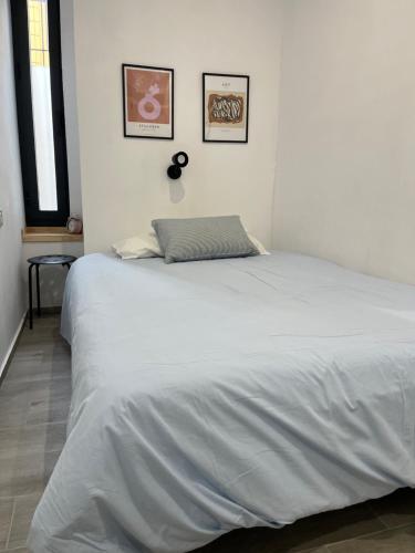 Katil atau katil-katil dalam bilik di Apartamento Chic Centro