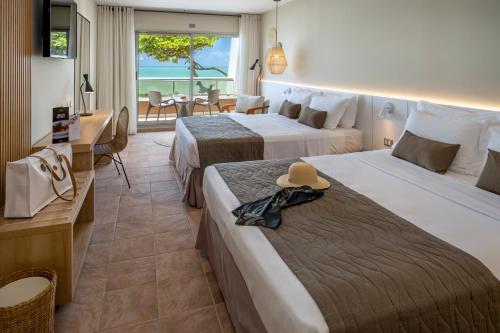 Postel nebo postele na pokoji v ubytování Serhs Natal Grand Hotel & Resort