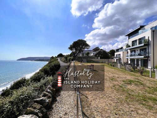 a sign that reads the island holiday company at New Horizon in Sandown