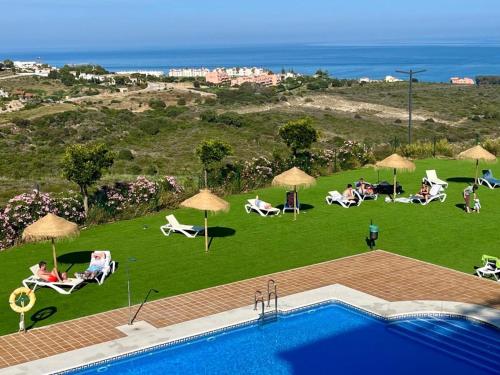 Small Oasis Nelson Mandela Apartment with sea view, two bedrooms, parking, terrace and pool