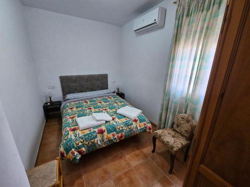 Postel nebo postele na pokoji v ubytování Corralazo B