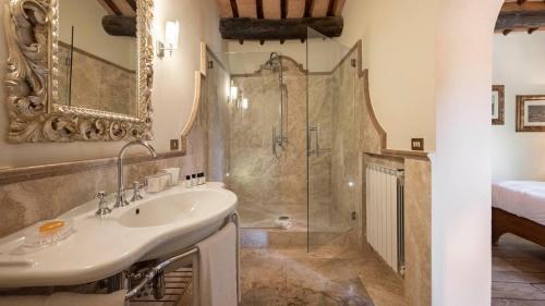 a bathroom with a sink and a shower at Villa La Selva Wine Resort in Bucine