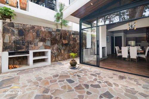 Un patio o zona al aire libre en Cabaña de lujo en La Toscana Mazamitla 1