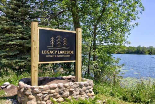 a sign for the research laboratory at a lake at Escape to a Studio Style Hideaway Nature and Lake in Clitherall