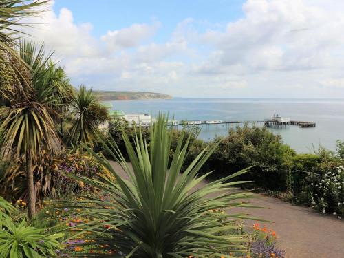 a view of the ocean from the garden at The Beach Retreat in Sandown