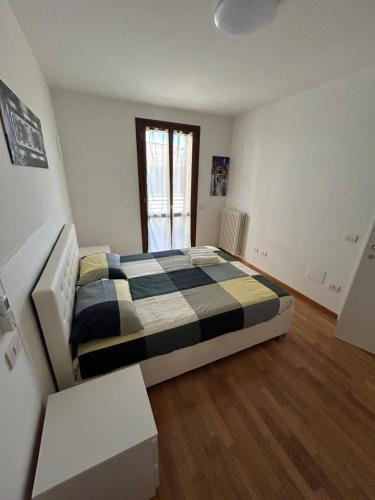 a bedroom with a bed in a room at Forli Sud - Romagna Central Suite Apartment - Parking in Forlì