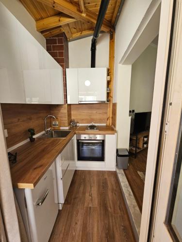 Dapur atau dapur kecil di Vila TAFA Apartments