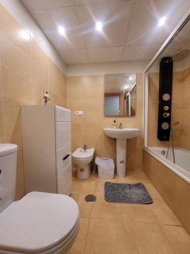 a bathroom with a toilet and a sink at Beautiful Apartment in La Manga in San Javier