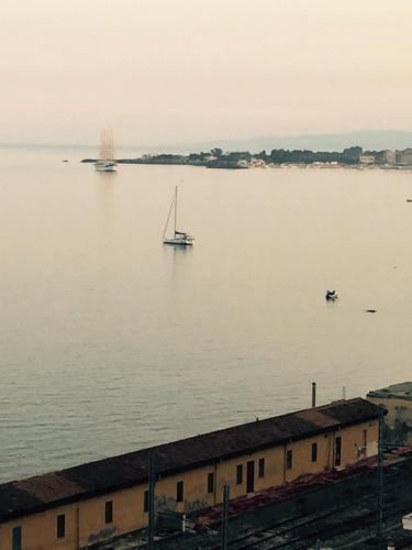 a sailboat in the middle of a large body of water at Holiday Home Gionny & Mary in Taormina