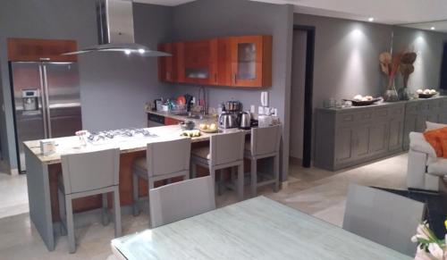 Kuchyň nebo kuchyňský kout v ubytování Bucerias, Beachfront Penthouse