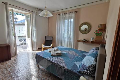 Ένα ή περισσότερα κρεβάτια σε δωμάτιο στο Casa Ilde