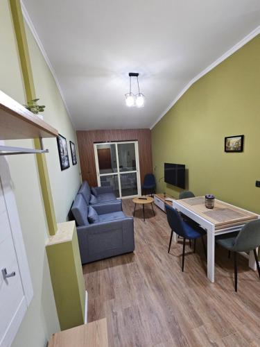 Televisyen dan/atau pusat hiburan di Vila TAFA Apartments