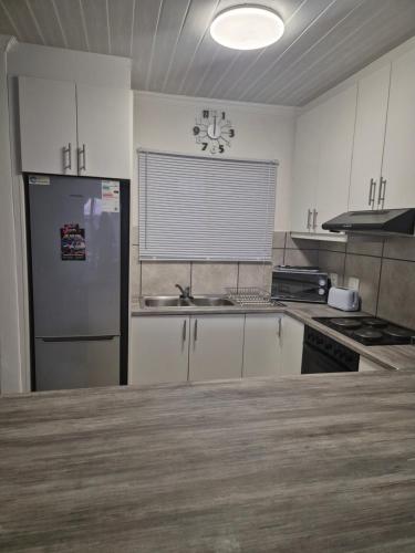 Kuchyň nebo kuchyňský kout v ubytování 30 Sunset Heights