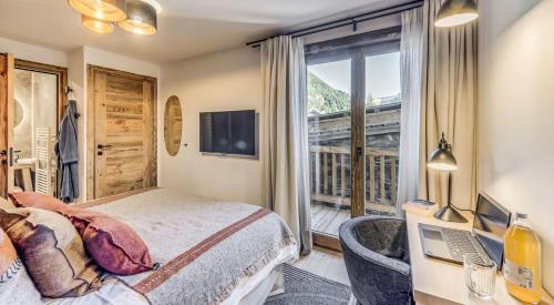 Una cama o camas en una habitación de Résidence Casa San Bernardo - Chalets pour 18 Personnes 851