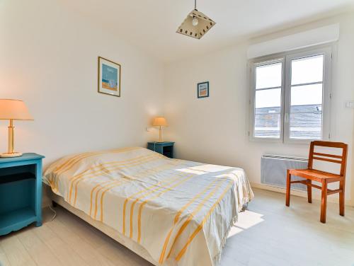 Postel nebo postele na pokoji v ubytování Les Bains de Mer