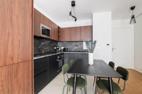 Photo de la galerie de l'établissement Le Wooden Oasis - spacieux T2 aux portes de Paris, à Saint-Ouen