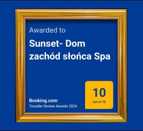 a gold picture frame with the textouched to sunset don zaldo storia spa at Sunset- Dom zachód słońca Spa in Mołdzie