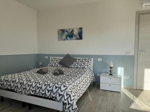 Ένα ή περισσότερα κρεβάτια σε δωμάτιο στο Atelier La Maison