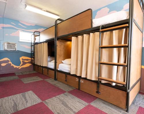 a bunk bed room with two bunk beds in it at RAD Hostel in Colorado Springs