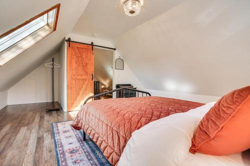 a bedroom with a bed and a window at Saint Paul Vacation Rental Near Shopping and Dining! in Saint Paul