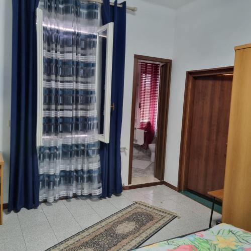 Postel nebo postele na pokoji v ubytování Room e Breakfast Diana e Ninni Salsomaggiore Terme
