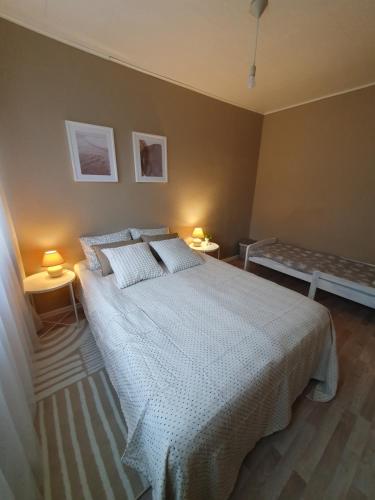 A bed or beds in a room at Airbnb Veriora