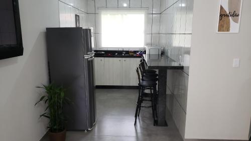 Dapur atau dapur kecil di Casa Completa da Magui - 01