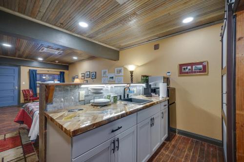 a kitchen with a sink and a counter top at Pet-Friendly Texarkana Studio in The Historic 1894 in Texarkana