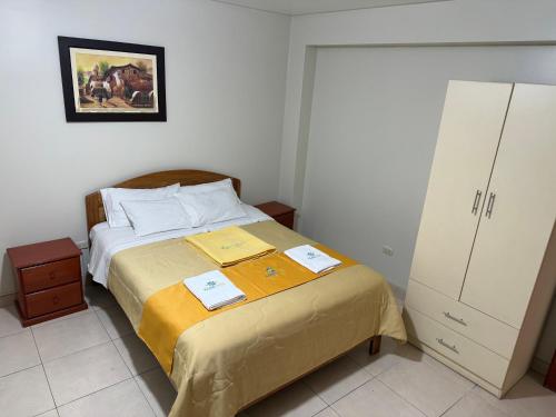 Postel nebo postele na pokoji v ubytování Illari Wari l - Hotel Sauna