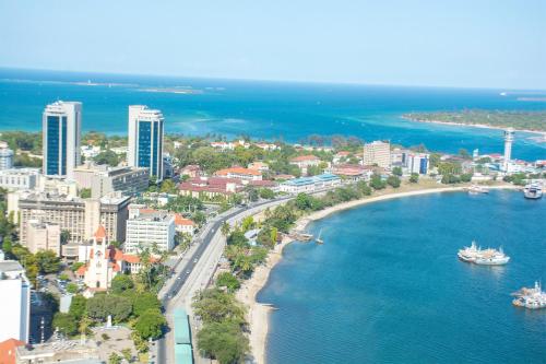 an aerial view of a city and the ocean at Lema Luxe Villa - Bahari Beach, Dar Es Salam in Dar es Salaam