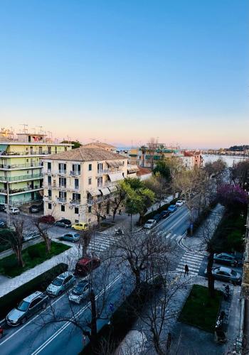 an aerial view of a city with cars and buildings at Elli & Klairi Apartment in Ágios Rókkos