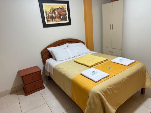 Postel nebo postele na pokoji v ubytování Illari Wari l - Hotel Sauna