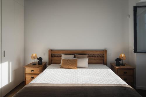 Katil atau katil-katil dalam bilik di Herdade do Lameiro - Turismo Rural