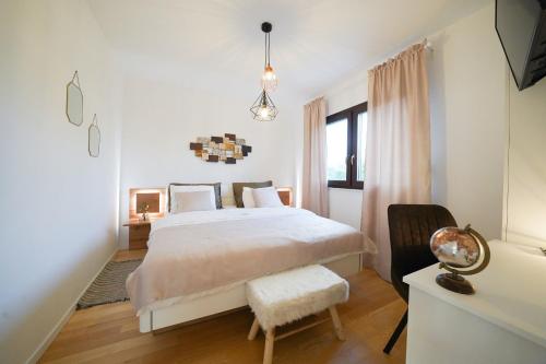 Ένα ή περισσότερα κρεβάτια σε δωμάτιο στο Villa SUNCICA