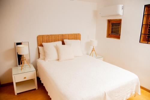 En eller flere senge i et værelse på Jasmine La Playita - Ocean Front